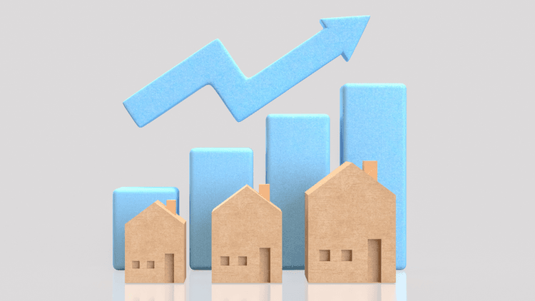 Wooden house models with an upward arrow and bar chart illustrating rising home prices and housing market trends.