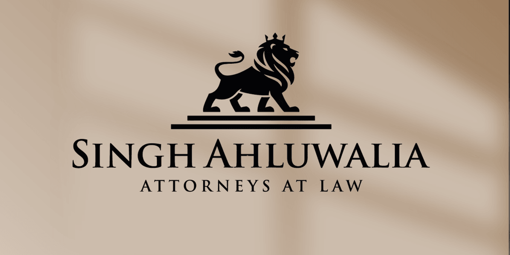 Singh Ahluwalia Attorneys at Law logo with a lion symbol, representing strength, justice, and compassionate legal advocacy.