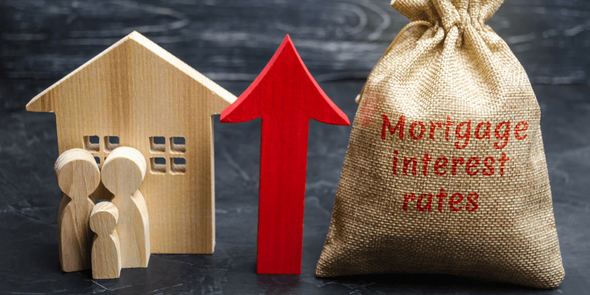 Wooden house, family figures, red arrow up, and burlap bag labeled mortgage interest rates