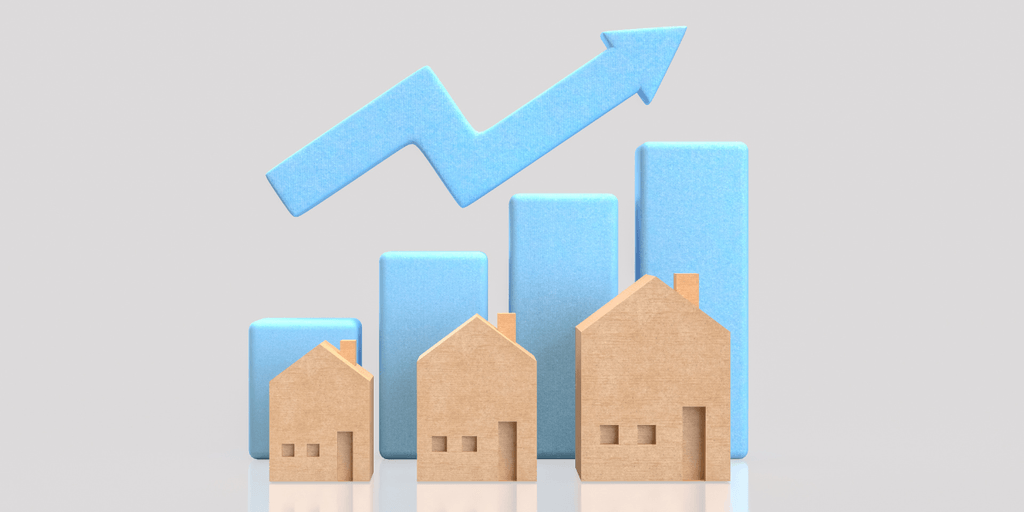 Wooden house models with an upward arrow and bar chart illustrating rising home prices and housing market trends.